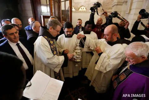 Custodian of the Holy Land Father Francesco Patton leads a mass at the Church of Nativity, in the West Bank city of Bethlehem on December 1, 2018. Photo by Wisam Hashlamoun