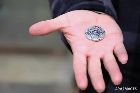 An elderly Palestinian man Khader Baidun, 70, displays pieces of heritage at his small museum in the Old city of Jerusalem, on December 11, 2018. Baidun has 10,000 pieces of heritage and the museum includes ancient gold...