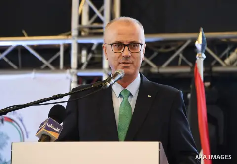 Palestinian Prime Minister Rami Hamdallah attends the first Palestine International Land Conference in the West Bank city of Ramallah on December 13, 2018. Photo by Prime Minister Office