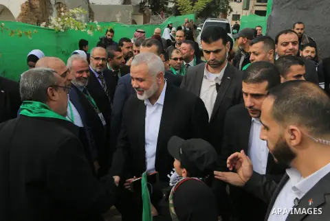 Chairman of the political bureau of the Hamas Palestinian Islamist movement, Ismail Haniyeh arrives to attend a rally marking the 31th anniversary of the founding of the Hamas movement, in Gaza city, December 16, 2018. P...