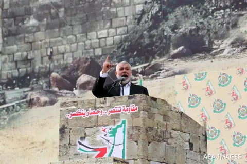 Chairman of the political bureau of the Hamas Palestinian Islamist movement, Ismail Haniyeh speaks during a rally marking the 31th anniversary of the founding of the Hamas movement, in Gaza city, December 16, 2018. Photo...