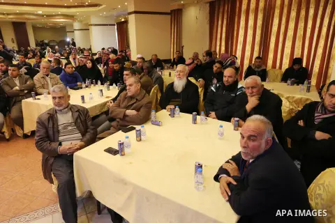Palestinians attend the national conference against normalization with Israel, in Gaza city on December 27, 2018. Israel has recently actively pursued rapprochement with a number of countries in the region and in Muslim-...