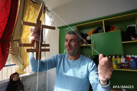 A Palestinian artist, Mahdi Karira, 39, makes a marionette at his house, in Gaza city, on January 13, 2019. A marionette is a puppet controlled from above using wires or strings depending on regional variations. A marion...