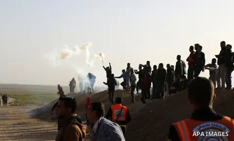 Palestinian protesters clash with Israeli troops following the tents protest where Palestinians demand the right to return to their homeland at the Israel-Gaza border, in Khan Younis in the southern Gaza strip, February...