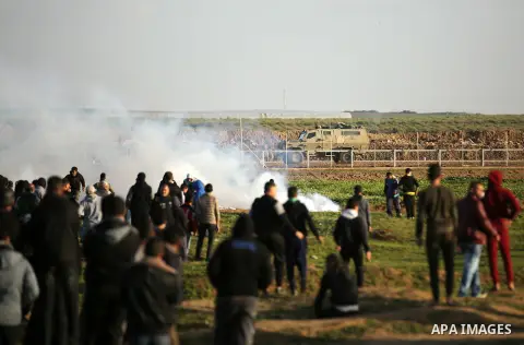 Palestinian protesters clash with Israeli troops following the tents protest where Palestinians demand the right to return to their homeland at the Israel-Gaza border, in the east of Gaza city, February 8, 2019. Two Pale...