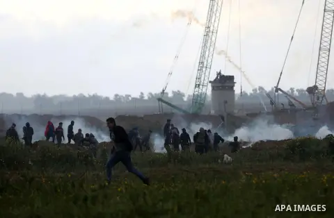 Palestinian protesters clash with Israeli troops following the tents protest where Palestinians demand the right to return to their homeland at the Israel-Gaza border, in Khan Younis in the southern Gaza Strip, March 01,...