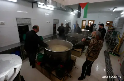 Palestinians prepare food to be distributed for free in the West Bank city of Hebron, 05 March 2019. Al-Takiyya Prophet Ibrahim Hospice was founded in 960 AD as an institute provides food for over than 2000 families week...