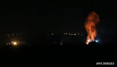 Fire is seen as Palestinian protesters calling themselves the "night confusion units", gather near the Gaza-Israel border east of central Gaza Strip, March 18, 2019. Hundreds of Palestinian protesters, have been organizi...