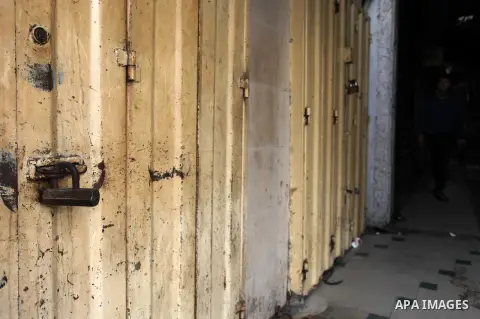 A picture taken on March 30, 2019 shows a closed gate of a shop during a strike marking the Land Day in Gaza city on March 30, 2019. This year, Land Day coincides with the first anniversary of the Great March of Return p...