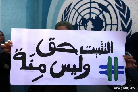 Palestinian contract employees of United Nations Relief and Works Agency (UNRWA) take part during a protest against job cuts by UNRWA, in Gaza City, on April 4, 2019. Photo by Mahmoud Ajjour
