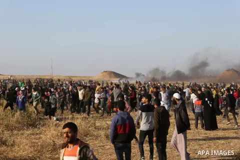 Palestinian protesters clash with Israeli troops following the tents protest where Palestinians demand the right to return to their homeland at the Israel-Gaza border, in Khan Younis in the southern Gaza Strip, April 12,...