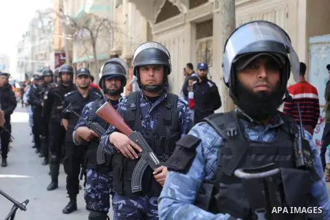 Palestinian members of the security services take part during a military parade, in Khan Younis in the southern Gaza strip on April 16, 2019. Photo by Ashraf Amra