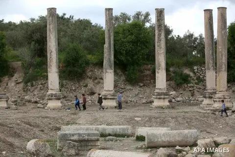 Israeli Jewish settlers visitors are seen at an ancient Roman historical site as they celebrating the Jewish holiday of Passover, in the village of Sebastia, near the West Bank city of Nablus, April 22, 2019. Photo by Sh...