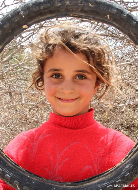 A Bedouin Palestinian girl plays outside her makeshift tent in the Ein al-Uja village, close to the West Bank city of Jericho, April 27, 2019. Israeli bulldozers had demolished the village in several times, but villagers...