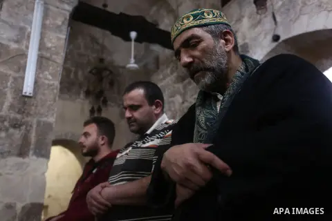 Palestinian Muslim worshipers attend the night prayer known as 'Taraweeh' at a mosque, during the Muslims holy month of Ramadan, in the West Bank city of Nablus on May 8, 2019. Muslims around the world celebrate the holy...