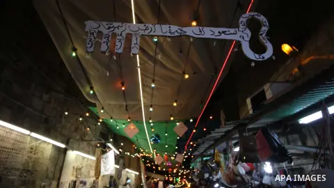 Lighting decorates are seen at the market during the Muslims holy month of Ramadan, in Jerusalem's Old city on May 26, 2019. Muslims around the world celebrate the holy month of Ramadan by praying during the night time a...