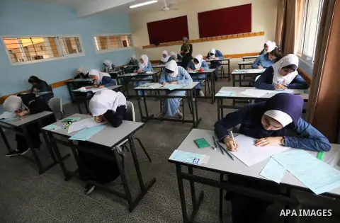 Palestinian students sit for their final high school exams, known as "Tawjihi" in Gaza city on June 8, 2019. More than 76130 students in the West Bank and Gaza Strip start Saturday their Tawjihi exam that qualifies them...
