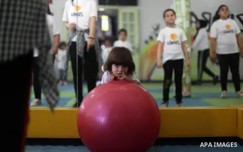 Palestinian children participate in a Zumba class during the summer vacation, at Jalaa Gym, in Gaza city, on June 30, 2019. Zumba is an exercise fitness program created by Colombian dancer and choreographer Alberto "Beto...