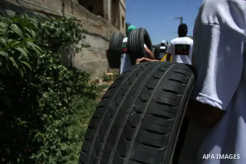 Palestinian protesters clash with Israel security forces following a weekly demonstration against the expropriation of Palestinian land by Israel in the village of Kfar Qaddum, near the West Bank city of Nablus on July 0...