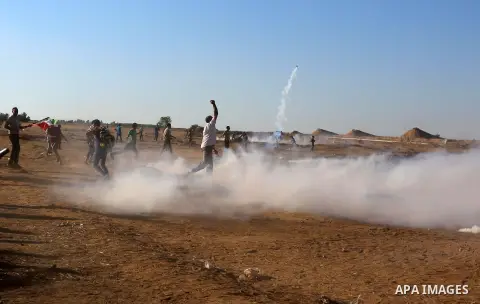 Palestinian protesters clash with Israeli troops following the tents protest where Palestinians demand the right to return to their homeland at the Israel-Gaza border, in Khan Younis in the southern Gaza Strip, July 05,...