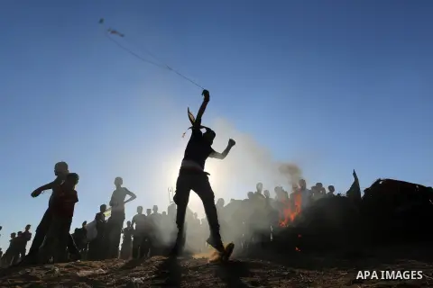 Palestinian protesters clash with Israeli troops following the tents protest where Palestinians demand the right to return to their homeland at the Israel-Gaza border, in Khan Younis in the southern Gaza Strip, July 05,...
