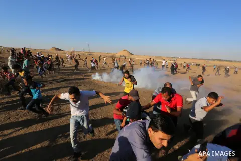 Palestinian protesters clash with Israeli troops following the tents protest where Palestinians demand the right to return to their homeland at the Israel-Gaza border, in Khan Younis in the southern Gaza Strip, July 05,...