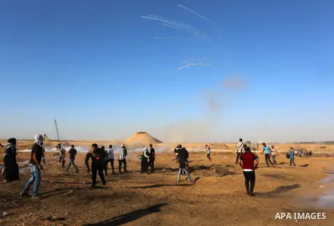 Palestinian protesters clash with Israeli troops following the tents protest where Palestinians demand the right to return to their homeland at the Israel-Gaza border, in Khan Younis in the southern Gaza Strip, July 05,...