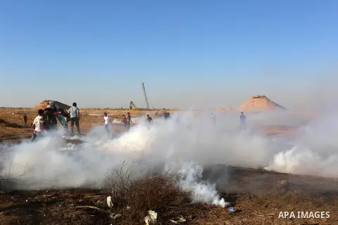 Palestinian protesters clash with Israeli troops following the tents protest where Palestinians demand the right to return to their homeland at the Israel-Gaza border, in Khan Younis in the southern Gaza Strip, July 05,...