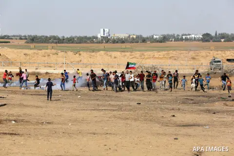 Palestinian protesters clash with Israeli troops following the tents protest where Palestinians demand the right to return to their homeland at the Israel-Gaza border, in Khan Younis in the southern Gaza Strip, July 05,...