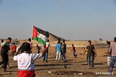 Palestinian protesters clash with Israeli troops following the tents protest where Palestinians demand the right to return to their homeland at the Israel-Gaza border, in Khan Younis in the southern Gaza Strip, July 05,...
