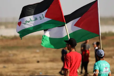 Palestinian protesters clash with Israeli troops following the tents protest where Palestinians demand the right to return to their homeland at the Israel-Gaza border, east of Gaza city, July 05, 2019. Photo by Mahmoud N...