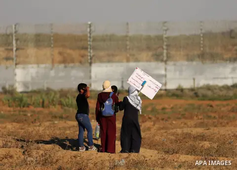 Palestinian protesters clash with Israeli troops following the tents protest where Palestinians demand the right to return to their homeland at the Israel-Gaza border, east of Gaza city, July 05, 2019. Photo by Mahmoud N...