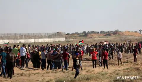 Palestinian protesters clash with Israeli troops following the tents protest where Palestinians demand the right to return to their homeland at the Israel-Gaza border, east of Gaza city, July 05, 2019. Photo by Mahmoud N...