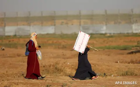 Palestinian protesters clash with Israeli troops following the tents protest where Palestinians demand the right to return to their homeland at the Israel-Gaza border, east of Gaza city, July 05, 2019. Photo by Mahmoud N...