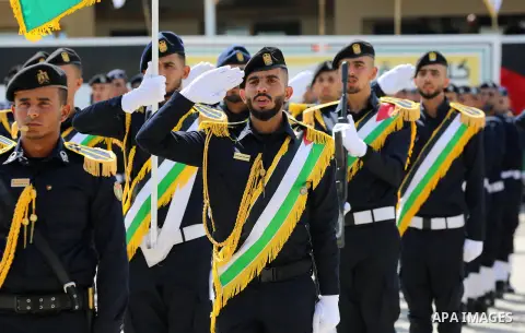 Palestinian police students show their skills during a graduation ceremony organised by the Ministry of Interior, in Gaza City on July 16, 2019. Photo by Ashraf Amra