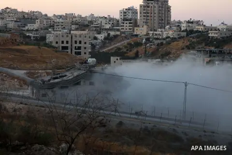 A picture shows the demolition of a Palestinian building which was under construction, in the the Palestinian village of Sur Baher in East Jerusalem, July 22, 2019. Israel demolished a number of Palestinian homes it cons...