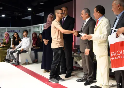 Palestinian Prime Minister Mohammad Ishtayeh attends the honoring ceremony of high school students, in the West Bank city of Ramallah, July 23, 2019. Photo by Prime Minister Office