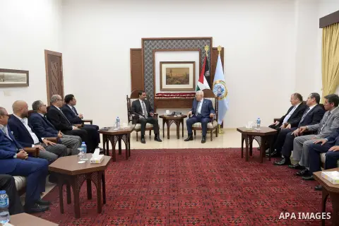 Palestinian President Mahmoud Abbas meets with Jordanian Minister of Trade and Industry, Tareq al-Hamouri, in the West Bank city of Ramallah, Jly 30, 2019. Photo by Thaer Ganaim