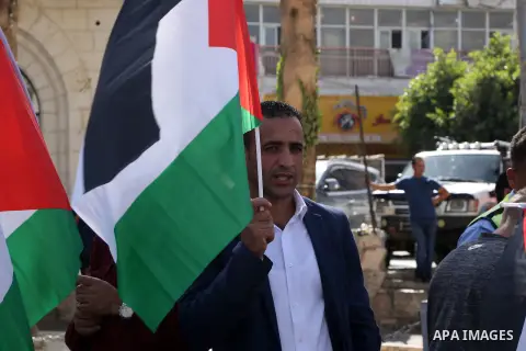 Palestinians take part in a protest in solidarity with prisoners in Israeli jails, in the West Bank city of Ramallah, on August 05, 2019. 40 Palestinian prisoners in Israeli jails are to begin a hunger strike today in su...
