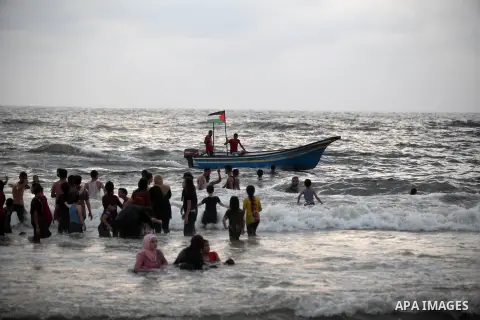 Palestinians with disabilities enjoy the beach at a cafe on the shores of the Mediterranean sea in Gaza city, on August 05, 2019. Gaza Municipality opened the first accessible beach for disabled individuals, old people a...