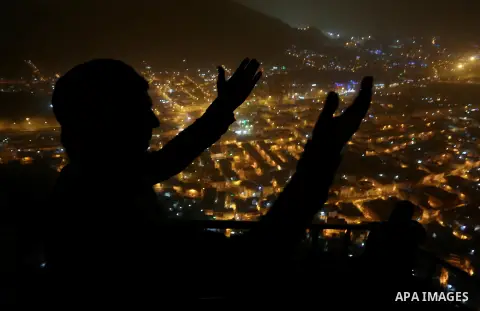 A Muslim pilgrim prays at Mount Al-Noor during the annual haj pilgrimage in Mecca, on August 6, 2019. Mount Al-Noor houses Ghar-E-Hira or Hira cave, where Prophet Mohammad is said to have spent a great deal of time in th...