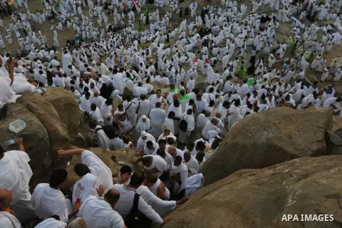 Muslim pilgrims pray on Mount Arafat, as Jabal al-Rahma near Mecca, as they take part in one of the Hajj rituals southeast of the Saudi holy city of Mecca on August 10, 2019. Arafat is the site where Muslims believe the...