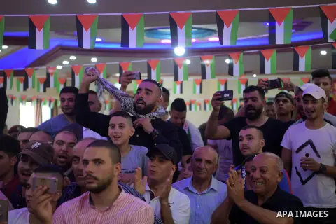 Palestinian President Mahmoud Abbas visits the Jalazone refugee camp, near the West Bank city of Ramallah, August 10, 2019. Photo by Thaer Ganaim