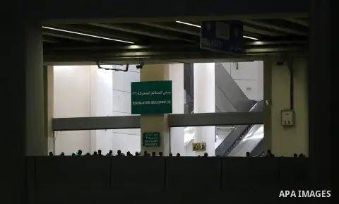 Muslim pilgrims throw pebbles at pillars during the "Jamarat" ritual, the stoning of Satan, in Mina near the holy city of Mecca, on August 12, 2019. Pilgrims pelt pillars symbolizing the devil with pebbles to show their...