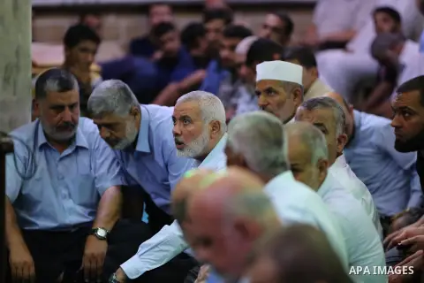 Head of the Political Bureau of Hamas Ismail Haniyeh attends the funeral of Palestinian policemen Salama al-Nadeem and Alaa al-Gharabli, in Gaza City on August 28, 2019. Three officers were killed on Tuesday when explosi...