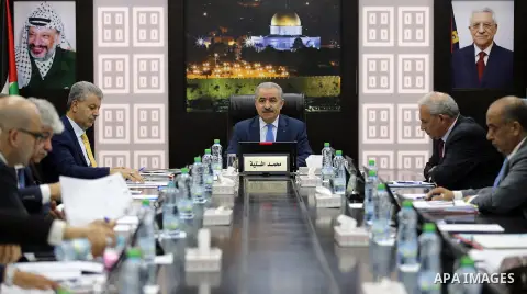 Palestinian Prime Minister Mohammad Ishtayeh chairs the weekly meeting of his government, in the West Bank city of Ramallah, on September 2, 2019. Photo by Prime Minister Office
