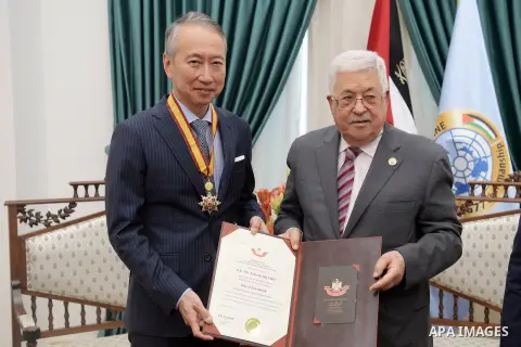 Palestinian President Mahmoud Abbas, meets with Japanese Consul General in Jerusalem Takeshi Okubo, in the West Bank city of Ramallah, September 12, 2019. . Photo by Thaer Ganaim