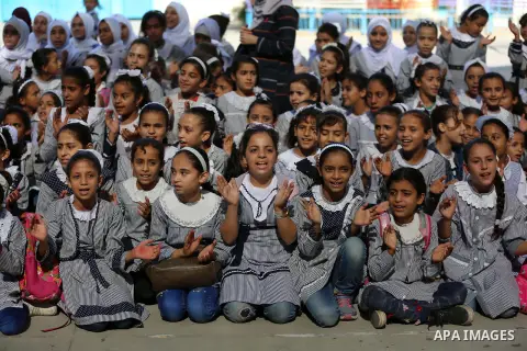 Palestinian students attend the Sea and Freedom Festival, at their school run by the United Nations Relief and Works Agency (UNRWA), in Beit Hanoun in the northern Gaza Strip, on September 26, 2019. Photo by Ashraf Amra