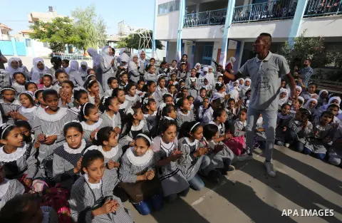Palestinian students attend the Sea and Freedom Festival, at their school run by the United Nations Relief and Works Agency (UNRWA), in Beit Hanoun in the northern Gaza Strip, on September 26, 2019. Photo by Ashraf Amra