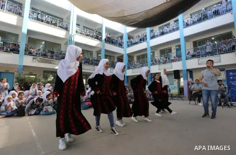 Palestinian students attend the Sea and Freedom Festival, at their school run by the United Nations Relief and Works Agency (UNRWA), in Beit Hanoun in the northern Gaza Strip, on September 26, 2019. Photo by Ashraf Amra